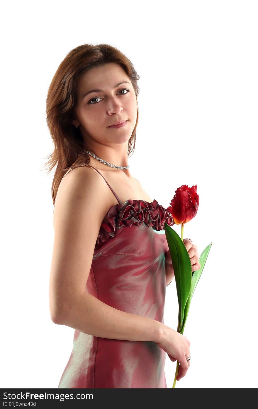 Girl in evening dress and tulip flower isolated on white background