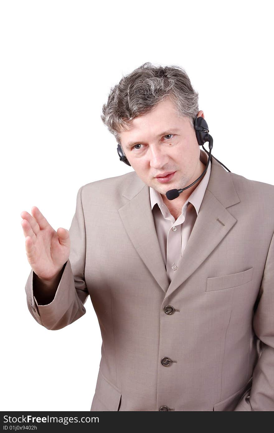 Handsome man with headset is making an order. Friendly negotiator. Call center operator.Customer service. Telephone operator.Hotline operator with headset. Handsome man with headset is making an order. Friendly negotiator. Call center operator.Customer service. Telephone operator.Hotline operator with headset.