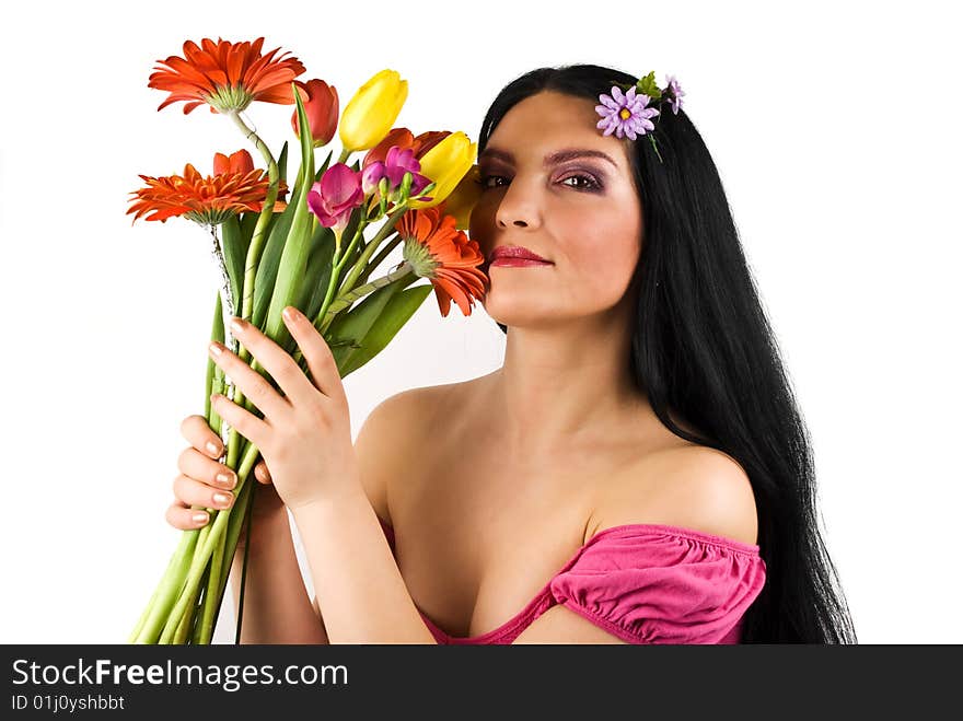 Beautiful spring woman holding fresh flowers near her face isolated on white background,check also Flowers. Beautiful spring woman holding fresh flowers near her face isolated on white background,check also Flowers