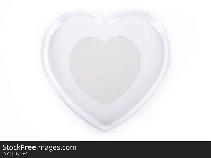 Glass heart isolated on a white background