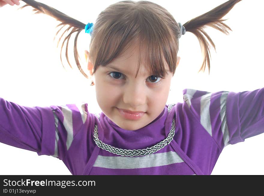 Cute little girl with two queues isolated on the white background. Cute little girl with two queues isolated on the white background