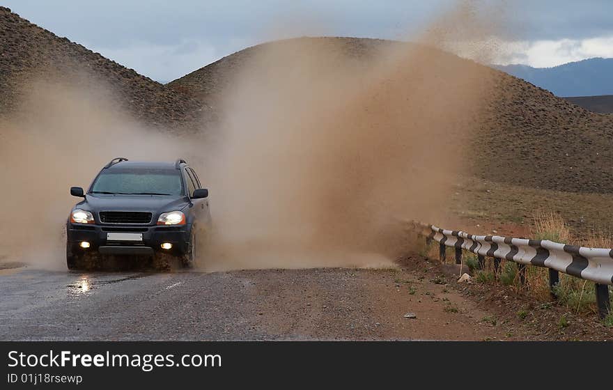 SUV on moutain road after rain. Series #4. SUV on moutain road after rain. Series #4