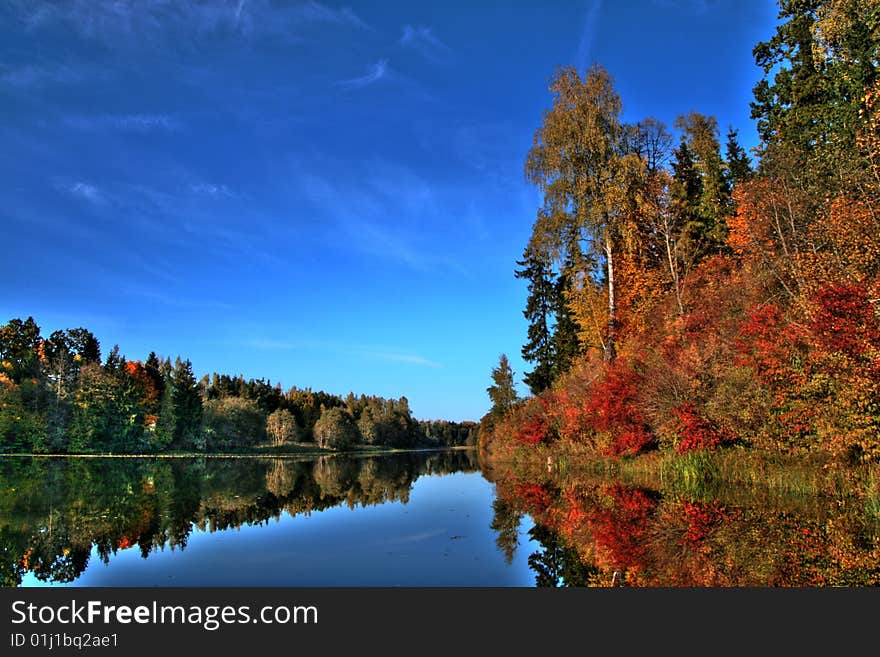 Peacefull lake in autumn tranquil ladndscape with gentle HDR touch. Peacefull lake in autumn tranquil ladndscape with gentle HDR touch