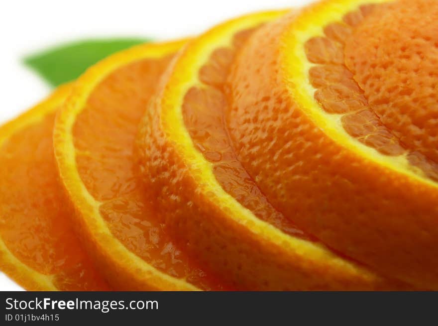 Orange with leaf on a white background