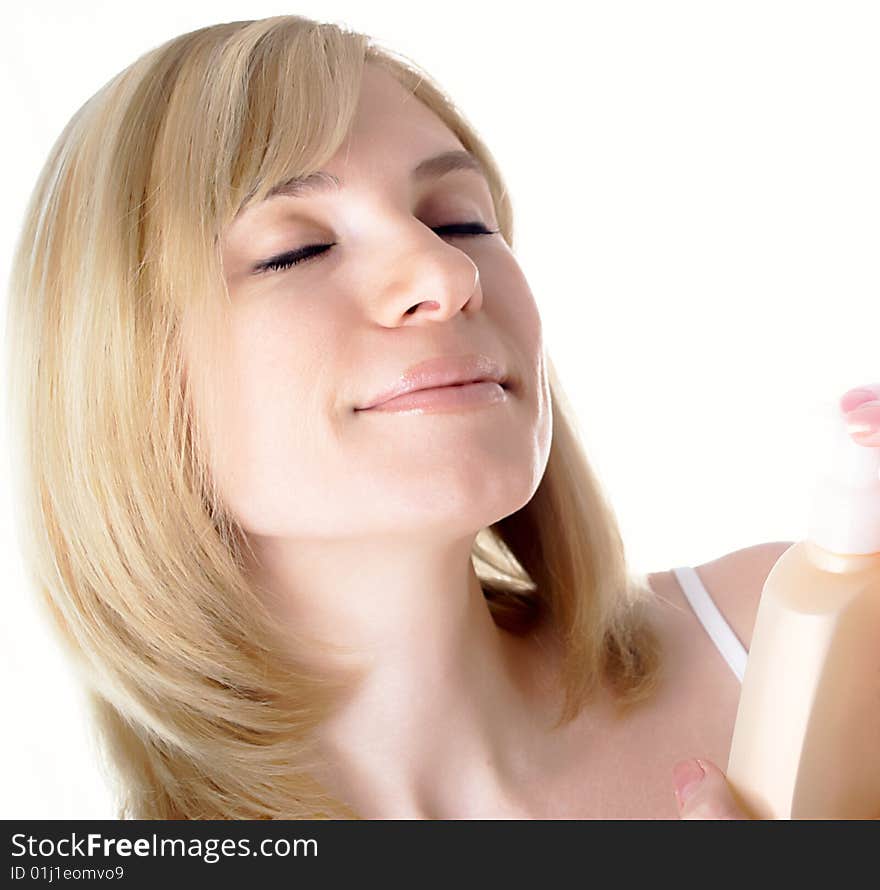 The elegant beautiful girl prepares for hygienic procedures