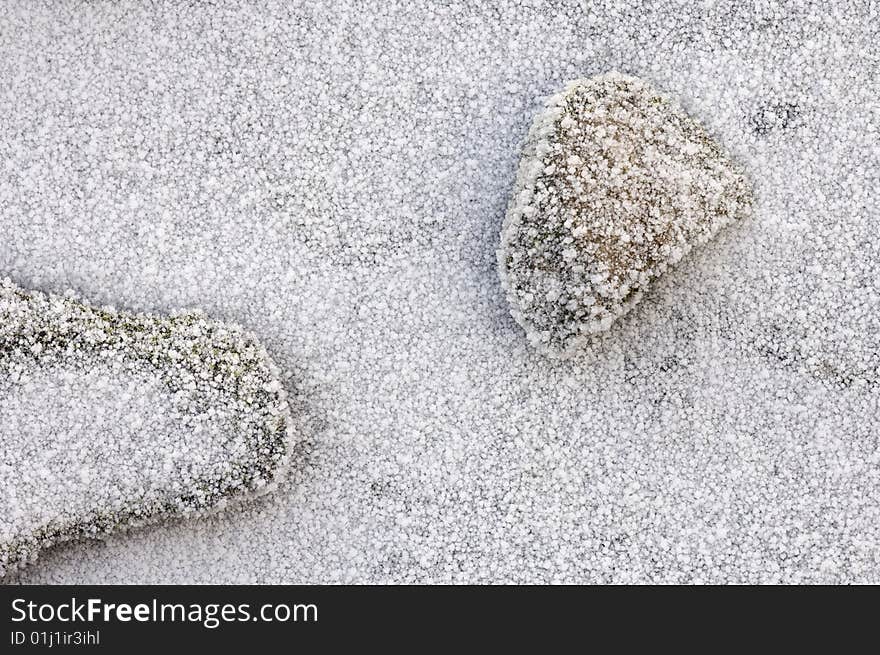 Two stones with frost