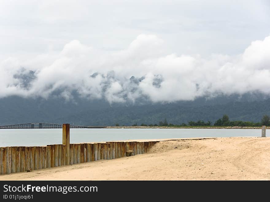 Langkawi beach and clouds on mountains