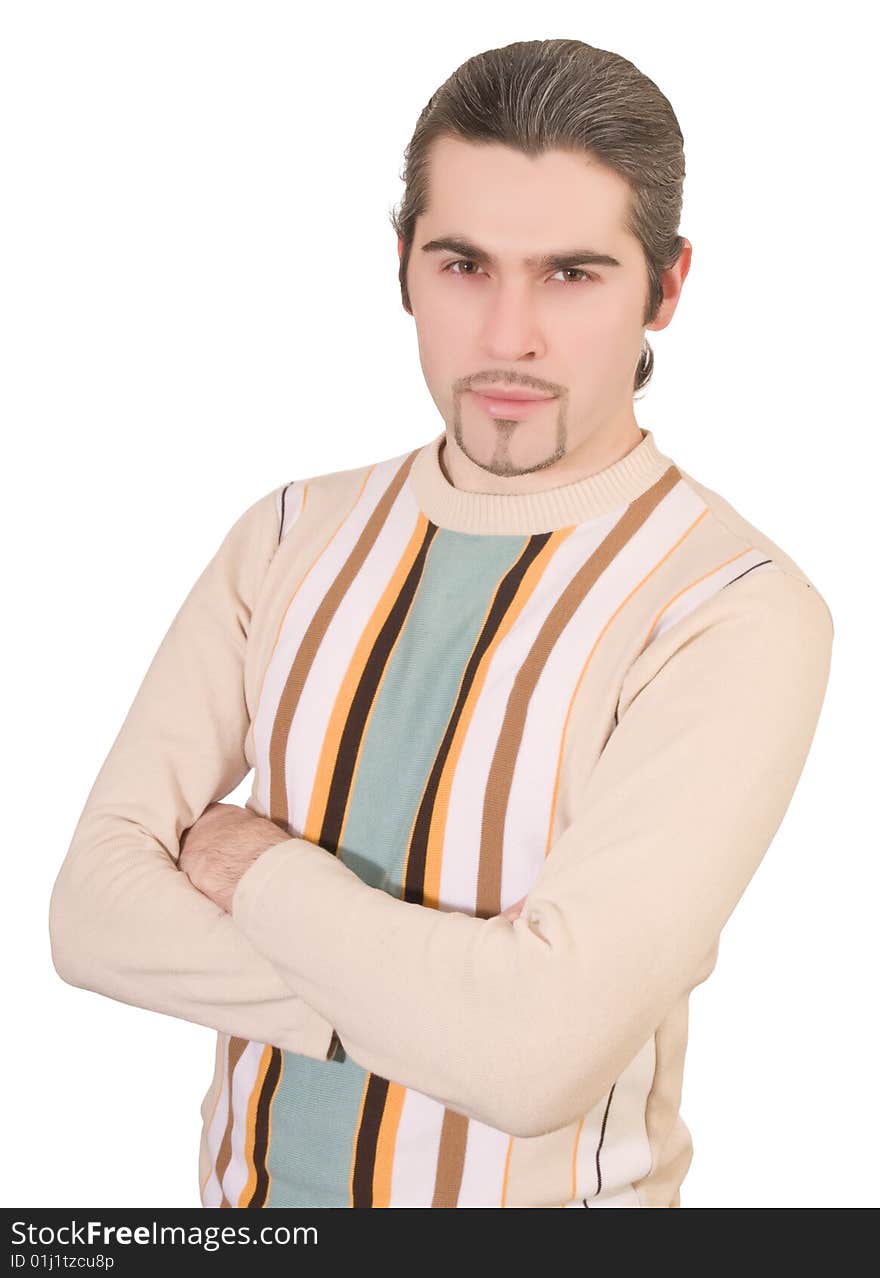 Young serious dark haired caucasian man in striped sweater isolated on white. Young serious dark haired caucasian man in striped sweater isolated on white