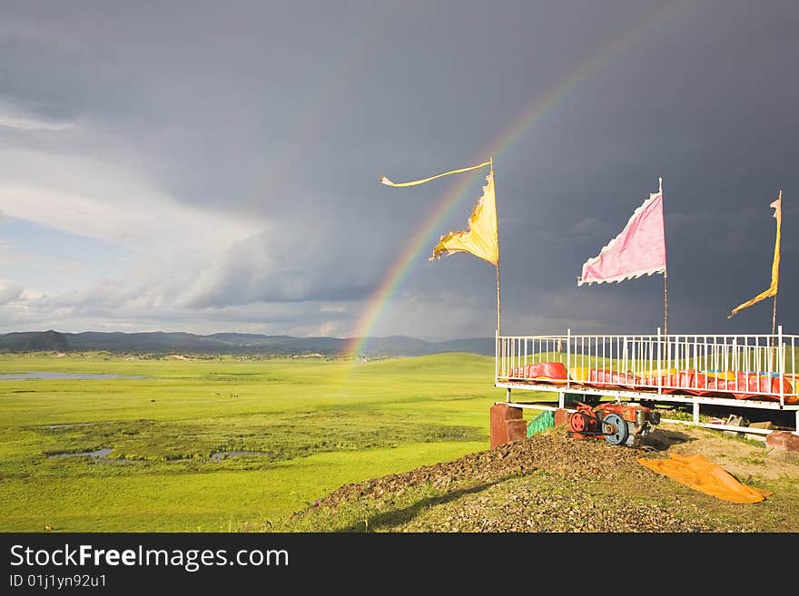 A rainbow arched across the sky