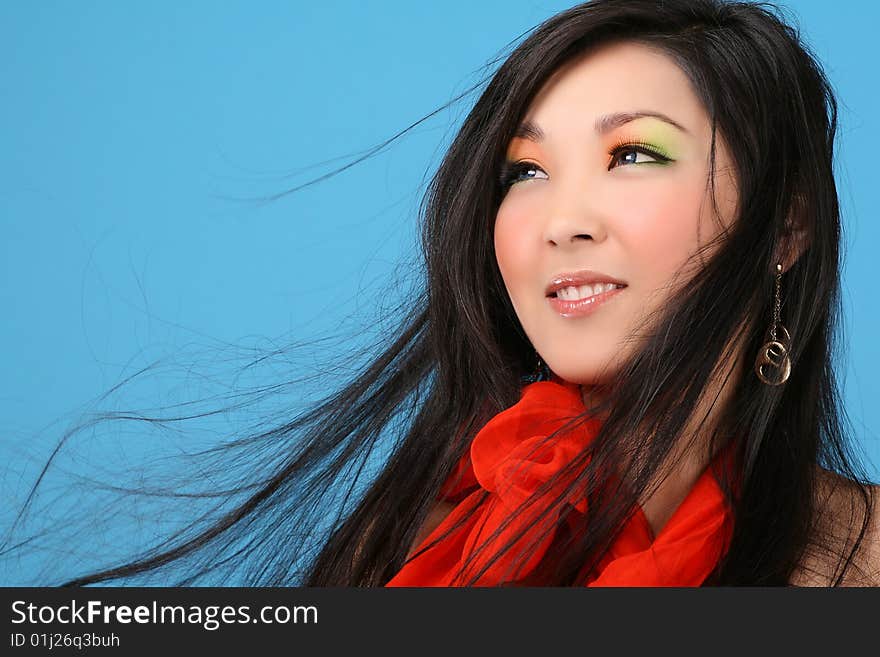 Asian woman on blue background