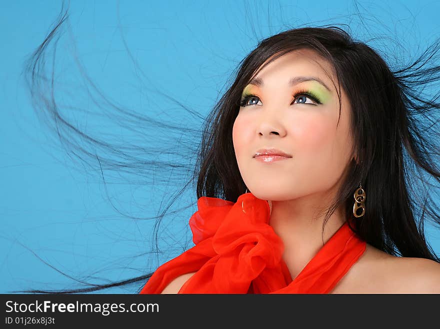 Asian woman on blue background