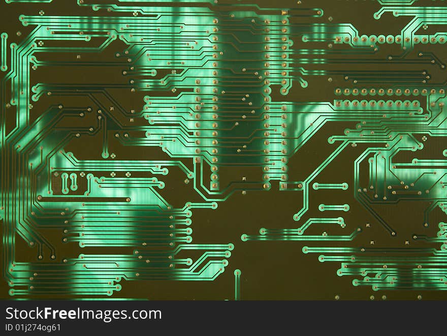 Green striped electronics circuit details in plate. Green striped electronics circuit details in plate