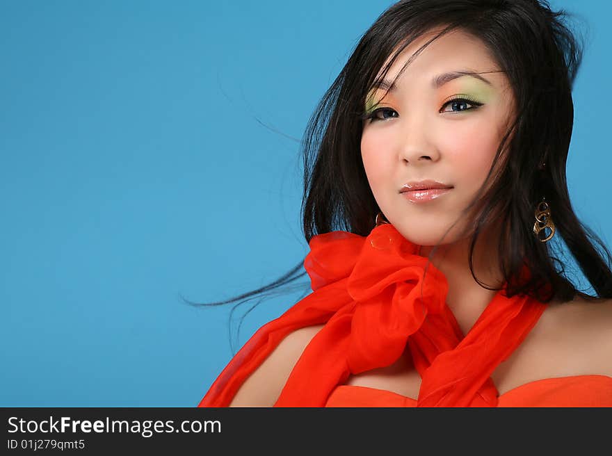 Asian woman on blue background