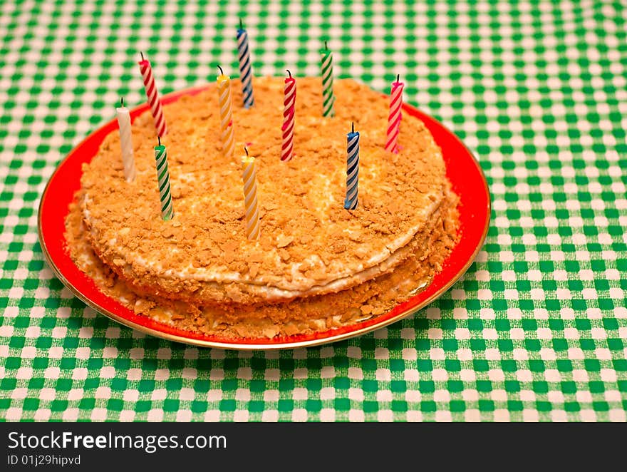 Cake with candles on the table