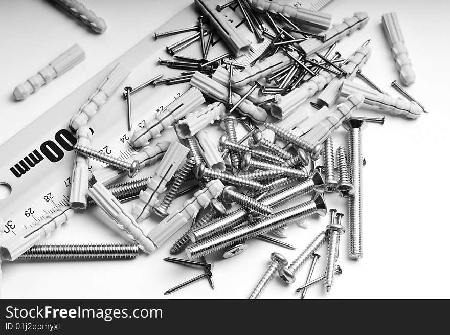 Bolts, nuts, steel on a white background