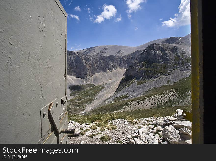 View from inside the hut Murelle Fusco, Maiella, Italy. View from inside the hut Murelle Fusco, Maiella, Italy