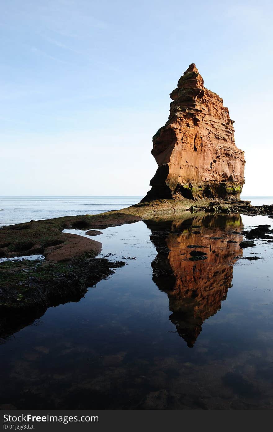 Red rock on a sea