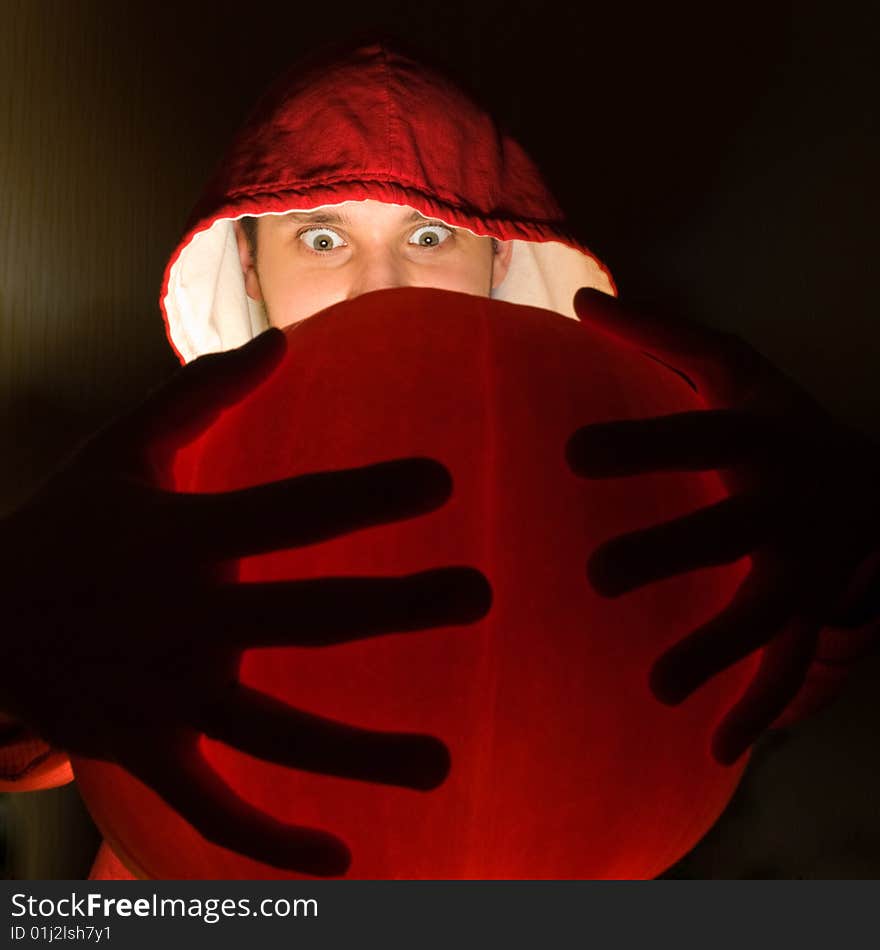 Awesome man holds ball of light in his hands. Awesome man holds ball of light in his hands