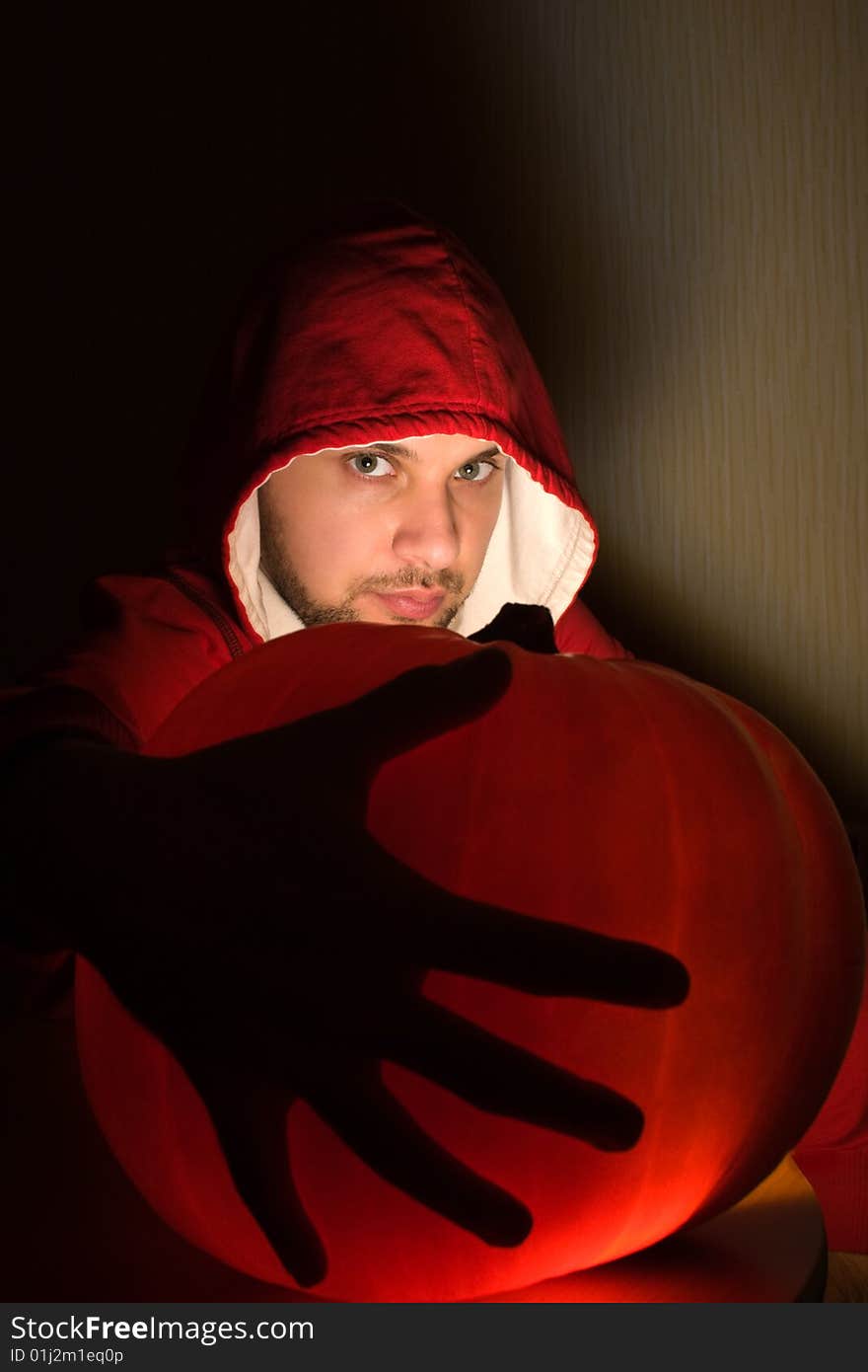 Awesome man holds ball of light in his hands. Awesome man holds ball of light in his hands