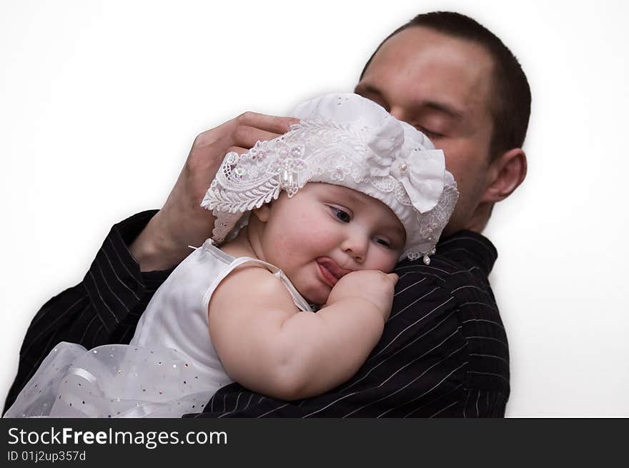 10 months old daughter hugging her father. 10 months old daughter hugging her father.