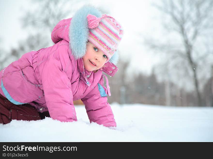 Little girl on snow, day