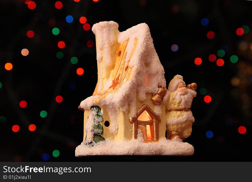 Toy small house with Santa Claus