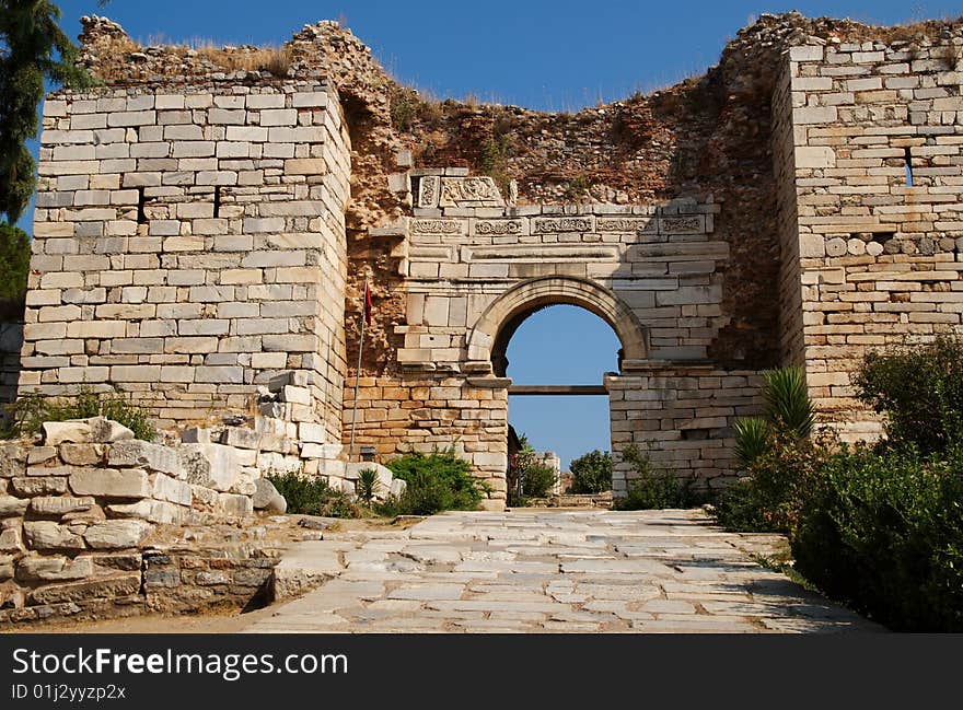 The stone gate that leads through the walls and into the Church of St John, Selcuk, Turkey. The stone gate that leads through the walls and into the Church of St John, Selcuk, Turkey