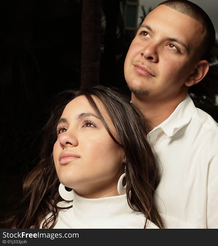 Young couple glancing at the light