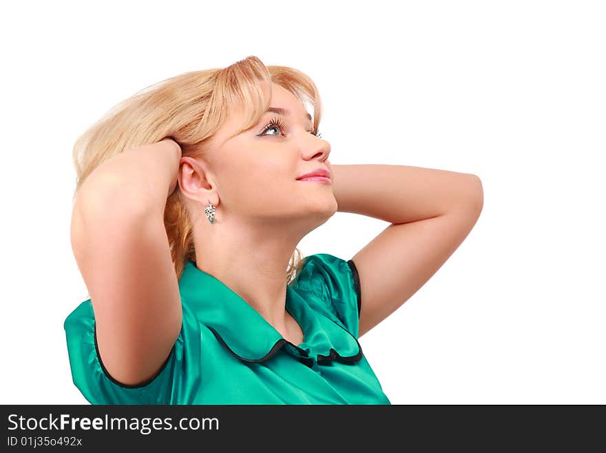 Young blonde looks upward on white