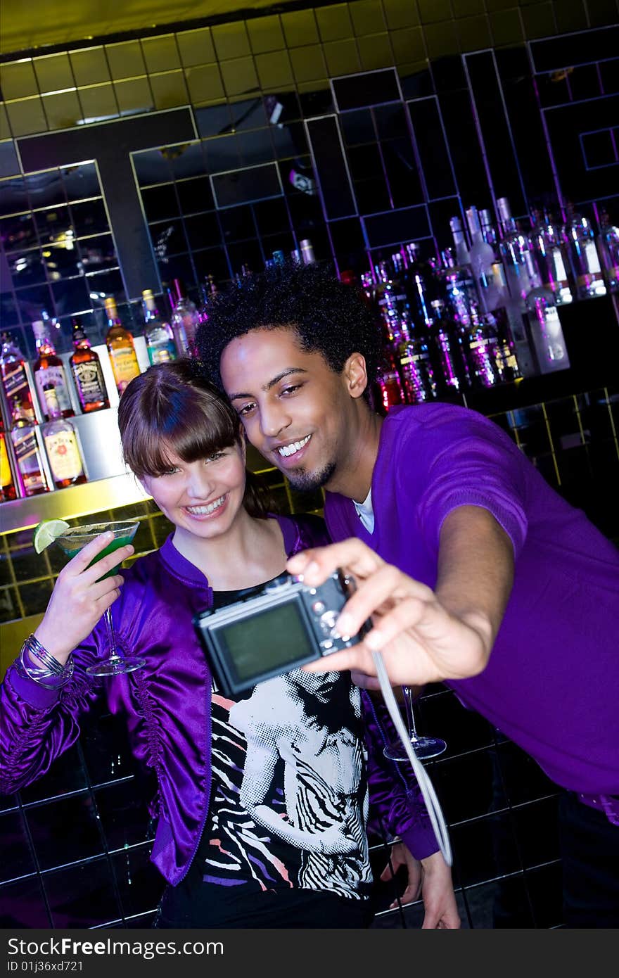 Happy Young men and happy young women taking self portrait