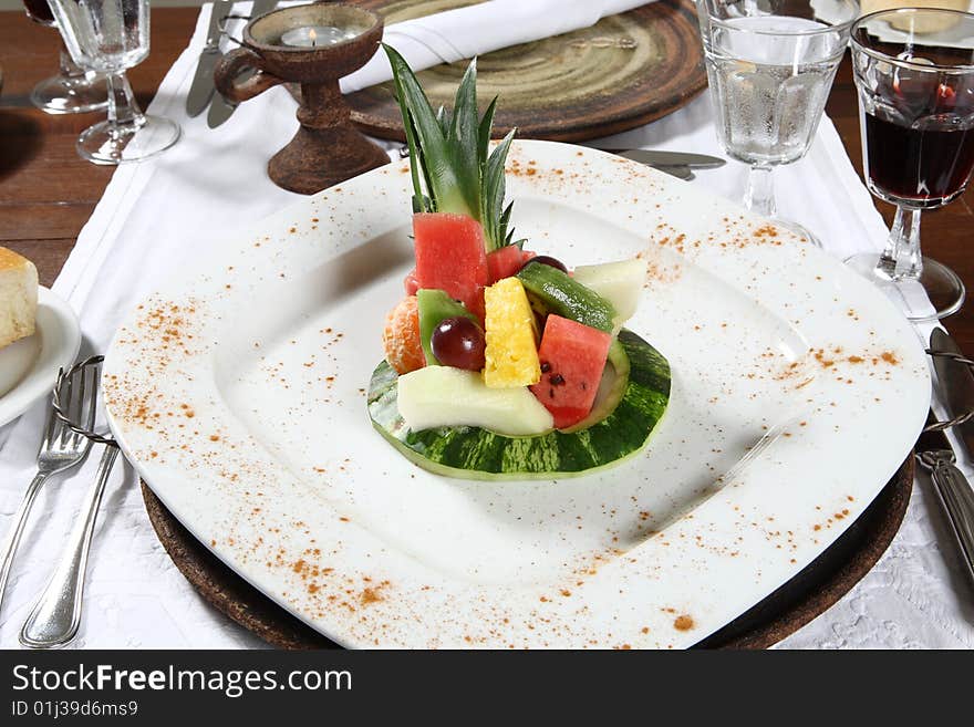 Delicious Fresh fruitsalad on a square white plate