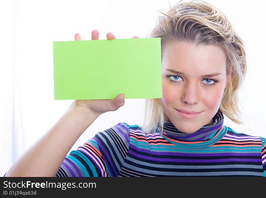 Female holding sign or board