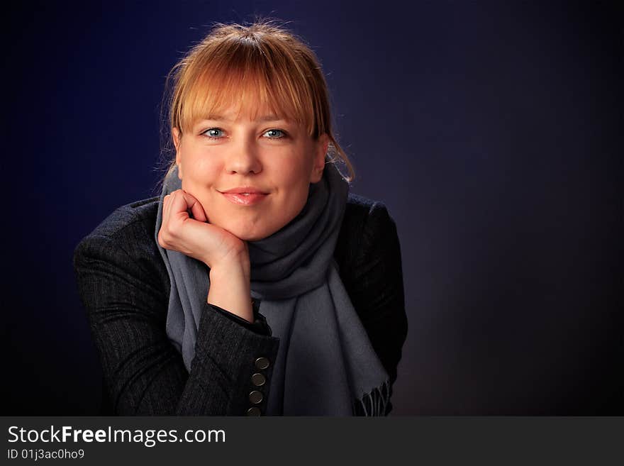 Portrait of female on a blue background in studio