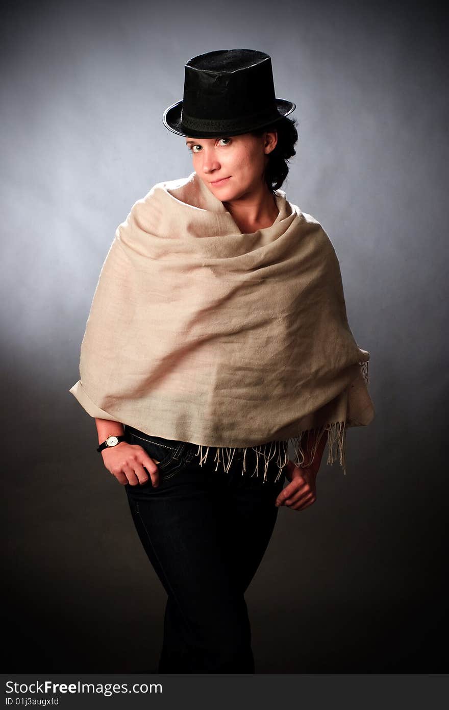 Portrait of female on a grey background in studio