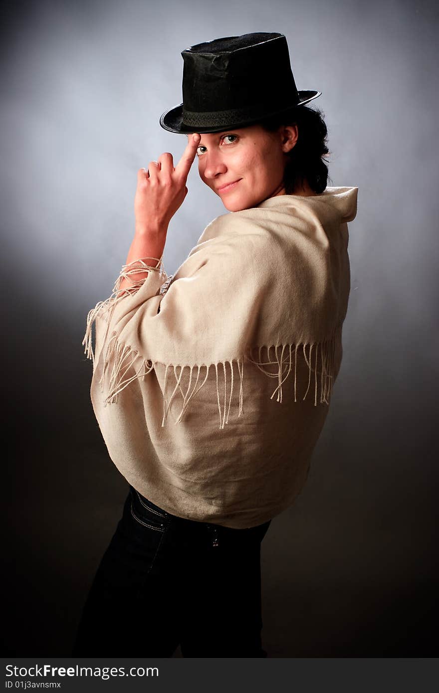 Portrait of female on a grey background in studio