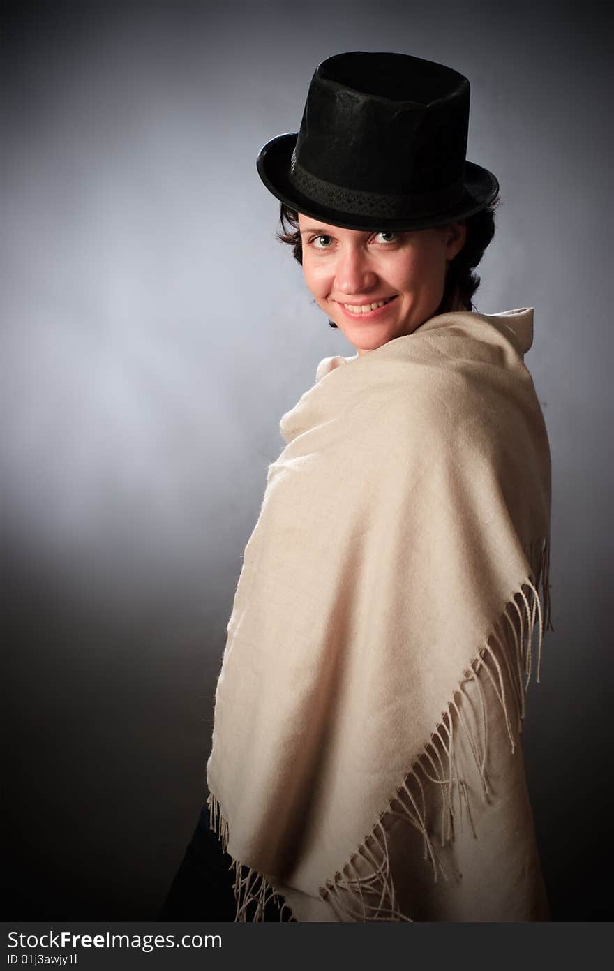 Portrait of female on a grey background in studio