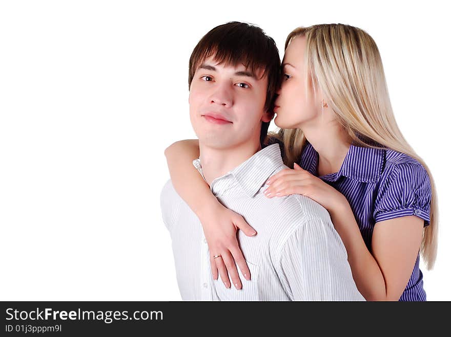 Young loving couple isolated at white background