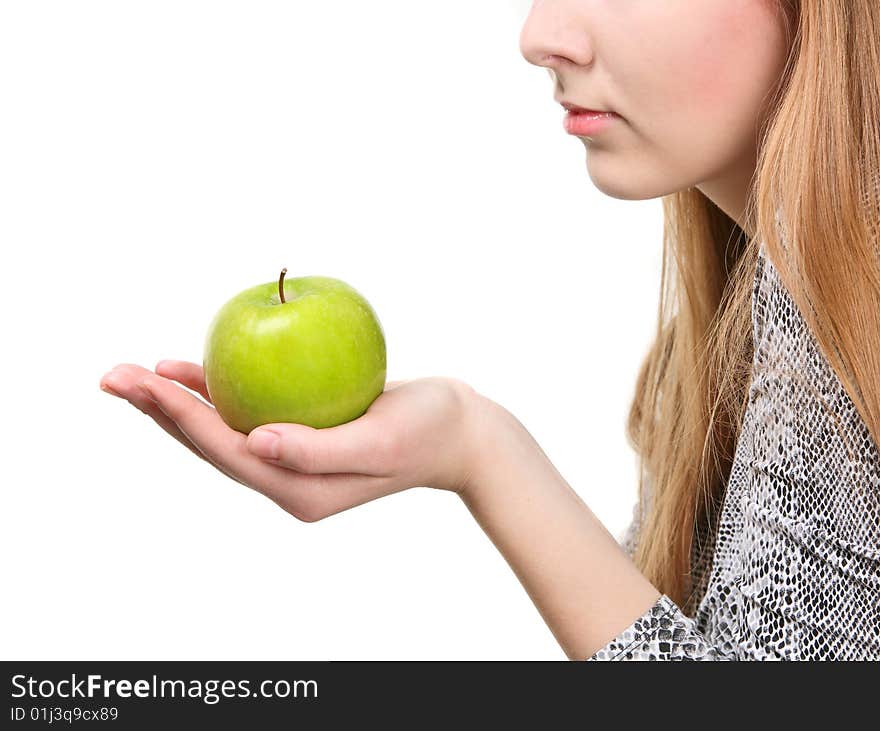 Woman holding fresh green apple