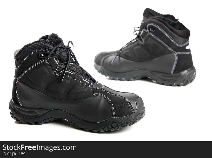 Two black men s winter boots on white