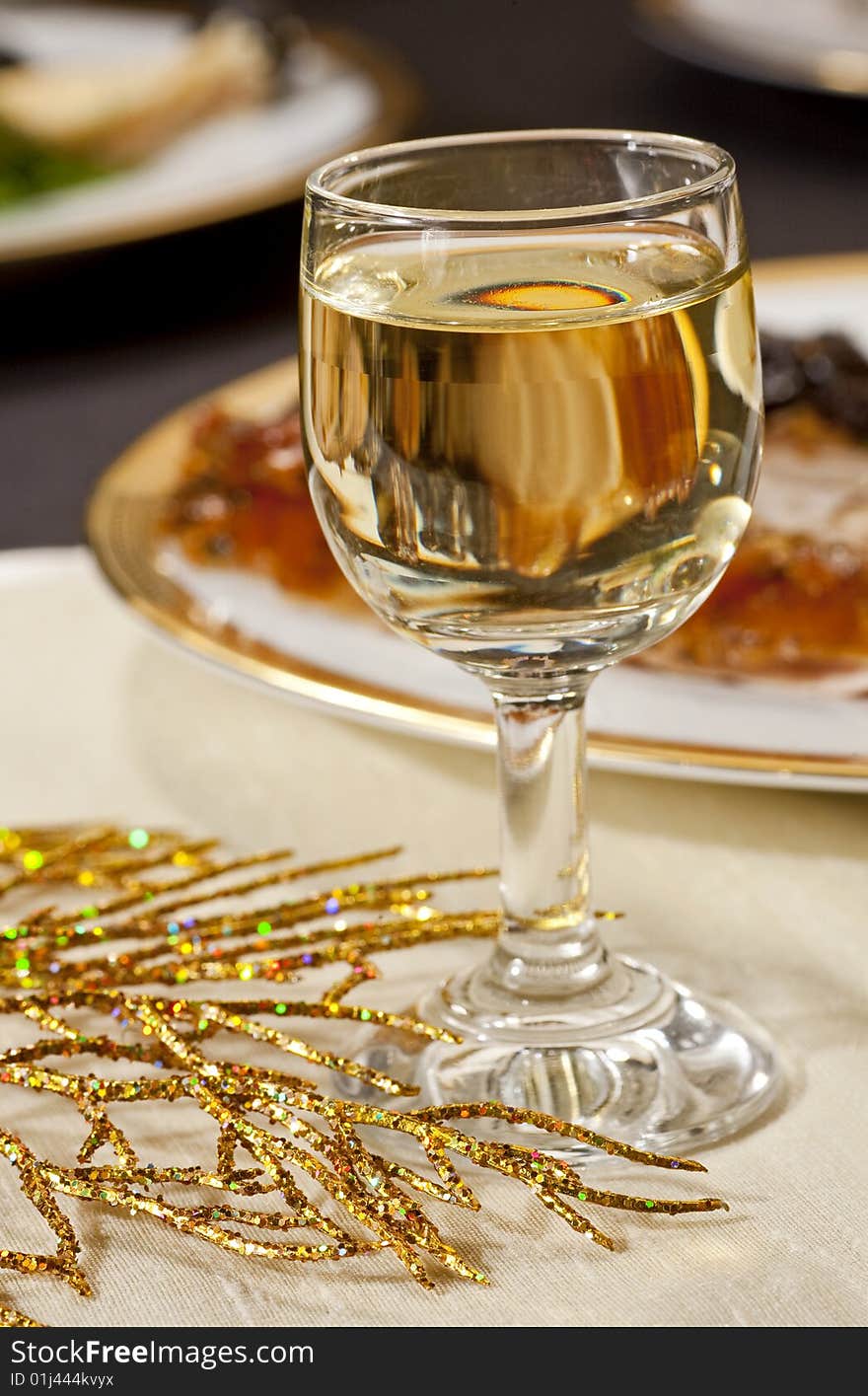 Glass of white wine on blur background. Glass of white wine on blur background