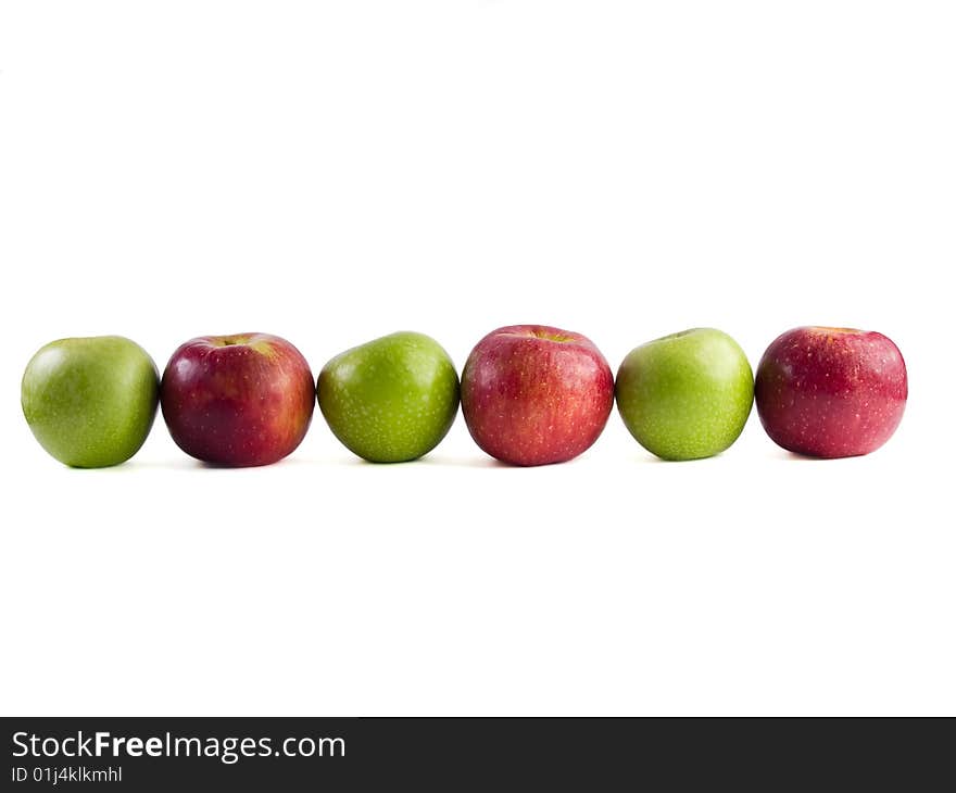 Six red and green apples on a white background. Six red and green apples on a white background