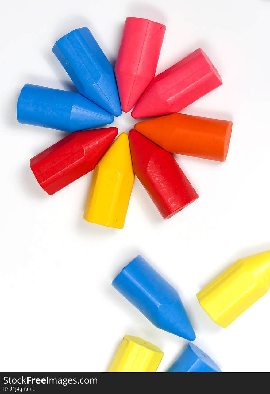 Octagonal star from children's wax pencils of bright colors