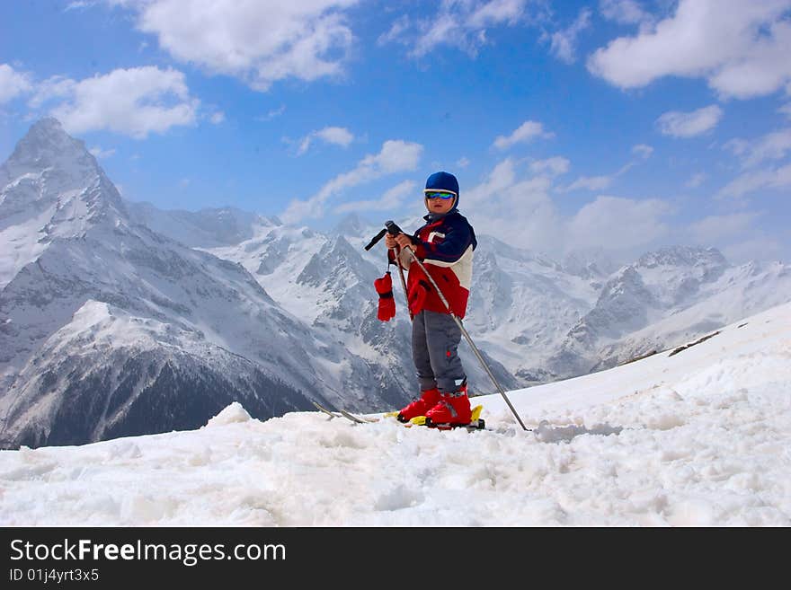 Baby mountain-skier