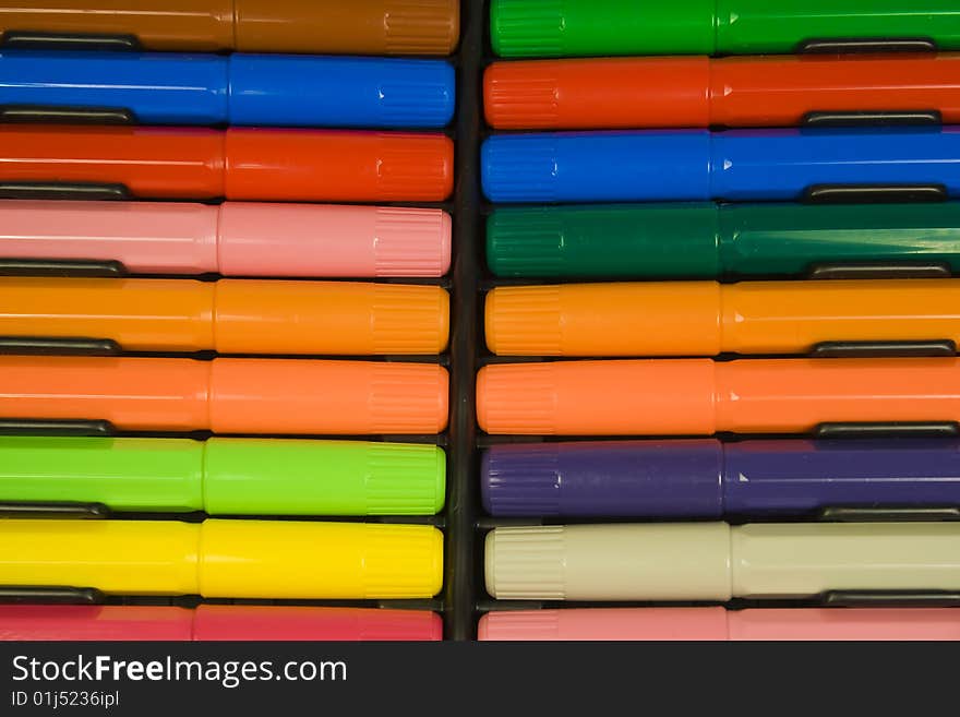 Color felt-tip pens with caps, laying in packing