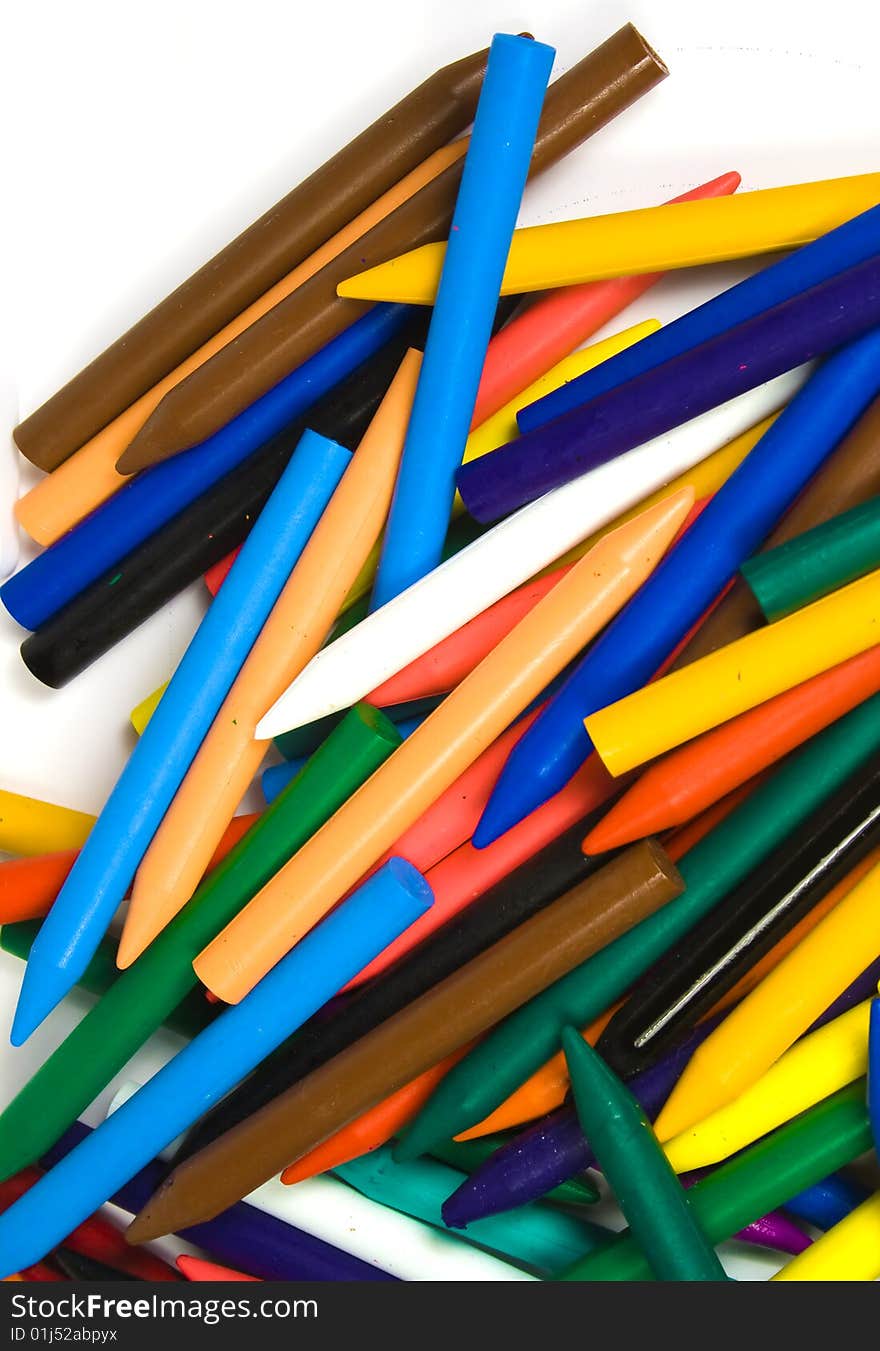 Close up of wax pencils fallen down in a random heap