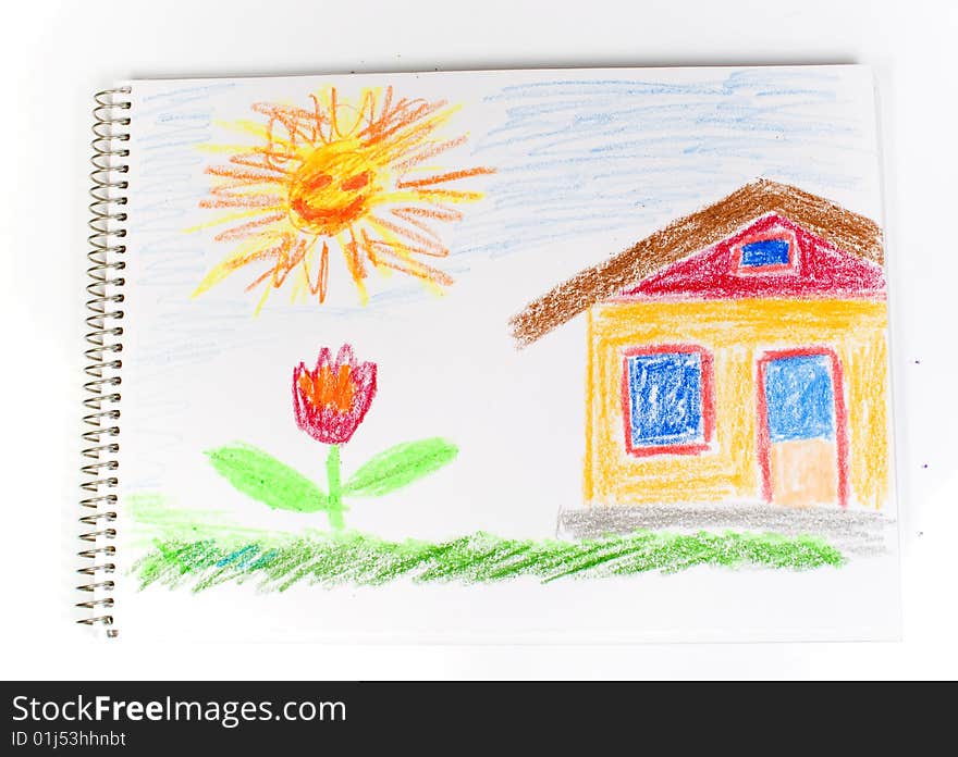 Figure the house, a green grass, a bright flower and the sun on notebook