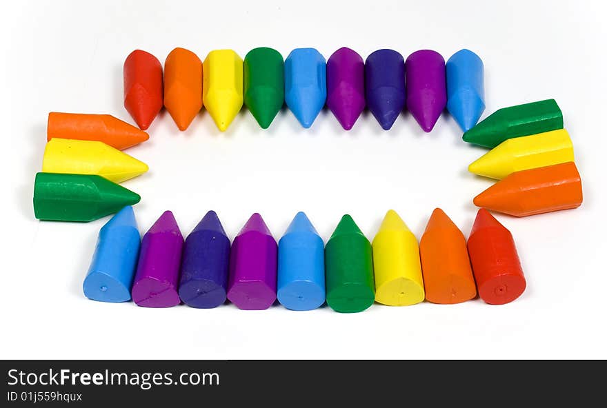 Original framework in the form of a rectangular double rainbow from wax pencils