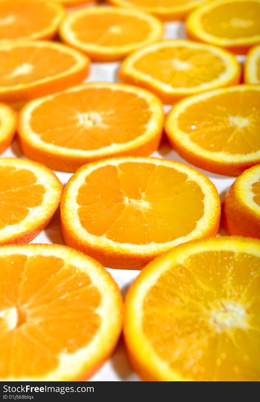 Background of orange fruits slices, selective focus. Background of orange fruits slices, selective focus