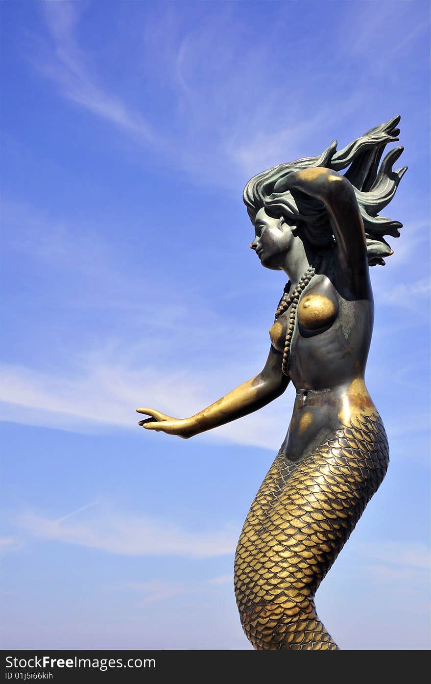 Brass mermaid sculpture