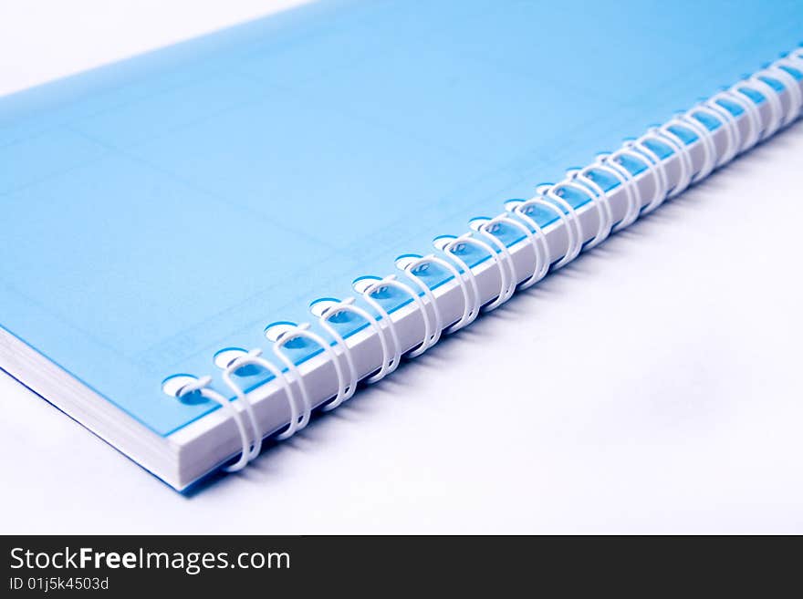 Macro view of notebook rings over white